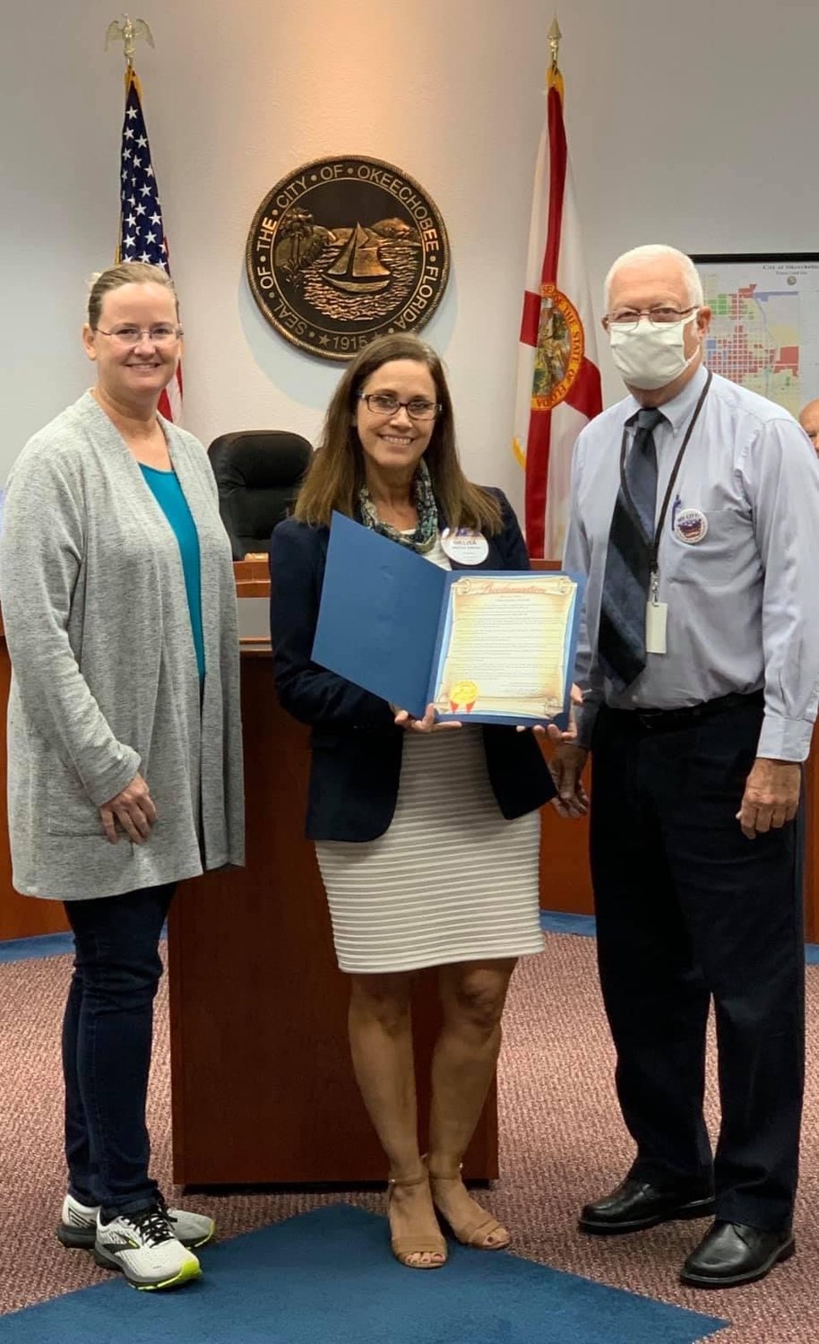 Mayor Dowling Watford presents a proclamation recognizing October 24, 2020 as World Polio Day at the Oct. 20, 2020 city council meeting. Recipients included Melisa Jahner, president Rotary Club of Okeechobee, and Denise Whitehead of Okeechobee County Parks and Recreation.